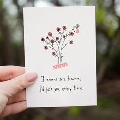 someone holding up a card with flowers on it that says, if flowers are flowers, i'd pick you every time