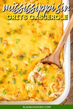 a casserole with cheese and green onions in a white dish on a wooden table