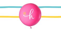 a pink balloon with the letter k hanging from it's side on a colorful striped background