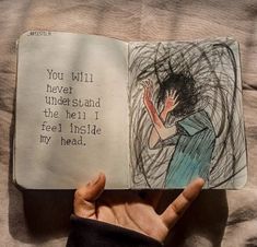 someone is holding up an open book with the words you will never understand that the hell i feel inside my head