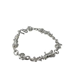 a silver bracelet on a white background