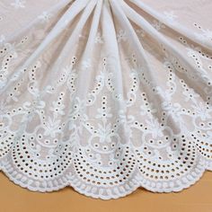 an image of a white doily on a table