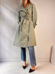 - Vintage Westfield green trench coat - Cotton poly lining acetate lining - Made in Canada - Tagged 14  Chest: 19.5" Length: 40.5" Sleeve: 24.5" We are not responsible for lost, stolen, or damaged packages once they have been shipped. Any additional customs duties or taxes incurred on international orders are the responsibility of the buyer. Please note that our items are vintage and may have minor flaws or imperfections due to their age, which adds to their unique character. Spring Military Double-breasted Outerwear, Spring Raincoat For Workwear, Military Style Single Breasted Outerwear For Spring, Gabardine Raincoat For Workwear, Solid Gabardine Raincoat For Workwear, Long Coat For Workwear In Rainy Season, Long Coat For Work During Rainy Season, Classic Gabardine Raincoat For Spring, Classic Spring Gabardine Raincoat