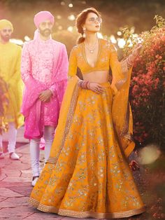 A perfect definition of superb craftsmanship, this beautiful yellow embroidery thai silk bridal lehenga choli is a must-have addition to any modern woman's wardrobe. Made with high-quality silk material in a stunning yellow color, this lehenga exudes elegance and sophistication.
The lehenga features exquisite zari work, embroidery work, sequin work, and dori with sequin embroidery border work, adding a touch of artistry to the ensemble. The choli, made of similar color silk material, also showca Sabyasachi Lehenga Bridal, Sabyasachi Bridal, Blouse Lehenga, Lehenga Choli Designs, Sabyasachi Lehenga, Yellow Lehenga, Lengha Choli, Green Lehenga, Thai Silk