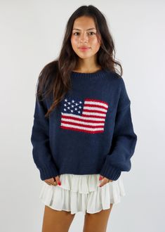 We are loving this American Flag Sweater. Featuring a bold flag design, this cozy sweater is perfect for the fall weather. The soft knit fabric and relaxed fit make it great for layering or wearing on its own. Pair it with denim shorts or jeans for a timeless, casual look. The Details Stitched American Flag on Front Ribbed Hem and Cuffs Rounded Neckline 100% Acrylic [#other] Wash With Like Colors Machine Wash Cold Do Not Bleach [/other] Hollister American Flag Sweater, Cute Clothes From Hollister, Hollister Outfits, Burr Basket, Hollister Clothes, Going Out Skirts, Flag Sweater, American Flag Sweater, Mini Skirt Dress