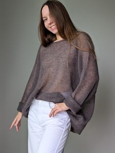 Thin, transparent, and airy jumper - just like a delicate spiderweb. Despite its lightness, it's warm, making it the perfect choice for any occasion. And weighing in at just around 100 grams, it feels like a soft, fluffy cloud against your skin. One size: Bust: 80-106 cm (32-42'') The width of the finished sweater: 64 cm (25.2'') length 64 cm (25.2'') Tolerance: +- 1-2cm (0.4-0.8'') - knitted loose fit jumper with a ribbed neckline, bottom of the jumper and sleeves; - this sweater is both durable, sustainable, and environmentally friendly. Don't settle for ordinary, experience the ultimate in comfort, style, and luxury. Materials: 75% Super kid mohair 25% natural silk Premium quality yarn from Italy. Super kid mohair - The best batches of kid mohair from young Angora goats up to 6 months o Feminine Fall Outfits, Mohair Jumpers, Luxury Materials, Angora Goats, First Haircut, Loose Fit Sweater, Delicate Feminine, Light Silk, Feminine Romantic