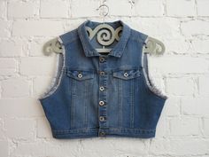 "Blue Denim Vest Womens Denim Vest Cropped Stretchy Jeans Waistcoat Country Western Vest Medium Size Label size: 40 Measurements (laying flat): Length (back): 15\" / 38cm Bust: 18.5\" / 47cm Waist: 15.5\" / 39.5cm Please check measurements to insure a proper fit. Remember to allow yourself some extra room for movement. You can compare these with something from your closet that fits you well. Condition: Good Vintage Condition SHIPPING * I ship worldwide via Priority mail. * I ship from Europe, so