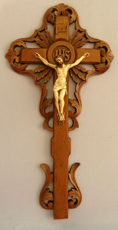 a wooden cross with a crucifix on it