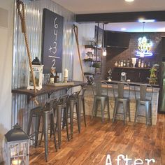 an empty bar with stools and tables in the corner, next to a sign that says after