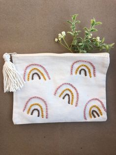 Hand embroidered pouch! 9x7 in Made with love and care. Pouch Embroidery, Embroidery Rainbow, Embroidered Pouch, Hoop Art Wall, Embroidered Rainbow, Machine Applique Designs, Makeup Bag Travel, Pouch Handmade, Pouch Makeup