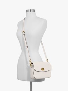 More compact than the original, the Cassie 19 cross body bag from Coach is ideal for nights and days on the go. Made from polished pebble leather, its finished with a signature turn-lock closure and three interchangeable straps for versatile styling. Detach the crossbody strap and carry by hand with the leather and chain top handles together or separately. The bag is completed with a hanging leather tab and Coach branding. Coach Branding, Cross Body Bag Black, Body Coach, Buy Bags, Leather Cross Body Bag