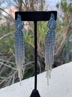 Blue fringe earrings Blue Fringe Tassel Drop Earrings, Evening Tassel Chandelier Drop Earrings, Elegant Blue Fringe Earrings, Elegant Blue Fringe Jewelry, Blue Fringe Dangle Chandelier Earrings, Blue Long Drop Tassel Jewelry, Blue Dangle Tassel Earrings With Fringe, Blue Fringe Drop Earrings, Blue Fringe Tassel Earrings For Party