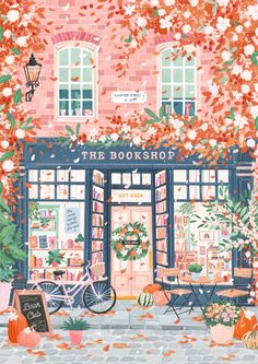 the bookshop is surrounded by autumn leaves and flowers