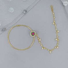 Look stunning with this gorgeous gold Kundan Bridal Nath/ Nose Ring with chain.  Enhace your either Modern or Traditional Bridal look.   Dimension:  6cm approx. We try to take photos as naturally as we can, but color can be slightly vary due to lighting.  Jewelry Care -- Keep all the jewelry away from water, perfumes, and other harsh chemicals Please note: No Returns No Exchange. But If you have any issue with your order, Kindly contact us before leaving a review Gold Chain Earrings For Wedding, Round Gold Chain Jewelry For Wedding, Traditional Gold Chain Jewelry For Wedding, Wedding Gold Chain Jewelry, Gold-tone Wedding Jewelry With Adjustable Chain, Gold-tone Pearl Chain Wedding Jewelry, Gold Plated Hoop Pearl Chain Jewelry, Gold Plated Hoop Jewelry For Wedding, Gold-plated Hoop Wedding Jewelry