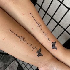 two girls with matching tattoos on their arms