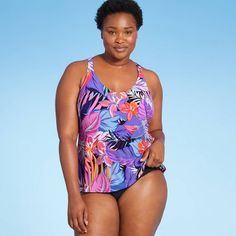 This V-Neck Tankini Top from Aqua Green makes for a chic, comfortable option you can pair with a variety of swim bottoms. The tankini top features a multicolor floral print that pairs easily with patterned and solid bottoms alike. A V-neckline provides a flattering, comfortable fit, while removable soft cups let you customize your level of coverage. Racerback straps give you a stay-put fit for confident wear in and out of the water, while UPF 50+ rated fabric helps protect your skin from UV rays Floral Print Stretch Tankini For Sunbathing, Stretch Floral Print Tankini For Sunbathing, Multicolor Tankini For Poolside Vacation, Stretch Tankini With Tropical Print For Sunbathing, Multicolor Tropical Print Tankini For Swimming, Multicolor Floral Print Tankini For Swimming, Stretch Tropical Printed Tankini, Tropical Stretch Printed Tankini, Tropical Printed Stretch Tankini