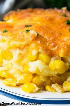 a close up of a plate of food with corn