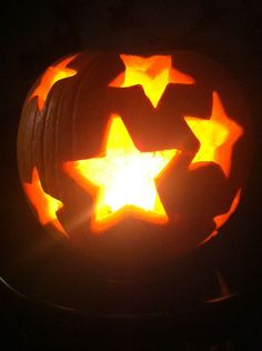 a pumpkin carved to look like a star