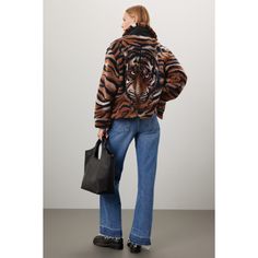 Brown animal print faux shearling (100% Polyester). Jacket. Long sleeves. Collar. Front zipper closure. 7.5" from shoulder to hemline. Imported. Faux Shearling Jacket, Polyester Jacket, Raw Hem Jeans, Rent The Runway, Jacket Long, Closet Designs, Sherpa Jacket, Tiger Print, Shearling Jacket