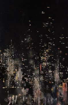 an abstract cityscape with lots of lights in the dark