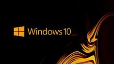 the logo for windows 10 is shown on a black background with gold swirls and waves