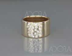 a gold ring with diamonds on it