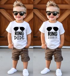 Ring Dude Shirt, Ring Bearer Shirt, Ring Security Shirt, Bridal Party Shirt, Wedding Rehearsal Shirt, Wedding Shirt, Funny Ring Bearer Gift Looking for the perfect ring bearer gift?  Look no further than this Ring Dude and Ring Security Shirt!  This funny and cute t-shirt is perfect for the little man who will be carrying the rings down the aisle. PLEASE check the shop announcements on the main page before making a purchase. ❤If you want this design on a tank top, long sleeves, a sweatshirt, or a hoodie, please let me know❤ ❤All items are custom made to order, we do not accept returns or exchanges. ❤Please carefully review the sizing details provided, as our t-shirts are unisex and not specifically tailored for women. ❤For a slimmer fit, ladies should consider ordering one size down. ❤To p Ring Security Shirt, Funny Ring Bearer, Ring Bearer Shirt, Ring Bearer Gift, Security Shirt, Ring Security, Ring Bearer Gifts, Wedding Shirt, Bridal Party Shirts