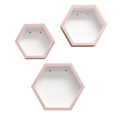 three pink hexagonal shelves on a white background