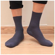 This pair of socks is best known for their high-quality bamboo fiber. It provides day-long comfort and the breathable factor allows air to flow freely and doesn't cause any odor problems. It makes for a great gift and is amazingly comfortable. It protects your feet and keeps them soft and supple. SpecificationsPieces: 10pcsSocks Tube Height: Middle TubeOrigin: CN(Origin)Thickness: STANDARDObscene Picture: NoSexually Suggestive: NoGender: MENSock Type: DressMaterial: Bamboo FiberModel Number: BSS Wedding Socks, Soft Socks, Mens Fashion Business, Soft Sock, Bamboo Fiber, Socks For Men, Long Socks, Girls Socks, Socks And Sandals