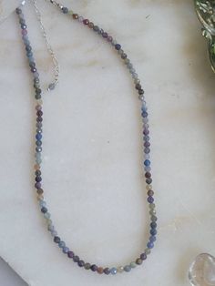 "Round faceted multicolor sapphire beaded sterling silver necklace. Looks great by itself or layered. Chain is sterling silver  15\" with 2.5\" chain extender to 17.5\" long" Sterling Silver Faceted Round Bead Necklaces, Faceted Round Bead Sterling Silver Necklace, Sterling Silver Faceted Round Beads Necklace, Blue Sterling Silver Beaded Necklace With Faceted Beads, Sterling Silver Necklace With Faceted Round Beads, Multicolor Sterling Silver Necklace With Polished Beads, Multicolor Sterling Silver Beaded Necklaces, Peace Sign Ring, Sterling Silver Choker Necklace