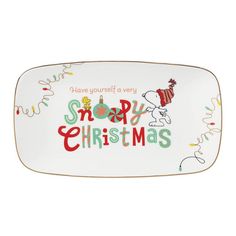 a snoopy christmas platter with the words, have yourself a very snowy christmas