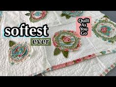 the quilts are made to look like they have flowers on them and words that read softest ever