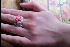 Lovely, detailed Rose in full bloom sets atop your choice of powder blue or moss green Filigree Victorian Ring.   The coating on this ring is bonded and durable professionally done.   Rose is 18mm in diameter.   Retails at $89.00 on sale for a limited time for only 38.00!   I searched far and wide for a filigree band that was sturdy, durable and timeless.   Not one of those cheap filigree bands that bend and break.   This will hold it's size and is adjustable.   have done sizes as small as 3.5 all the way up to people who wear them beyond size 10.   To give you an idea, at size 7 there is about a quarter inch gap in the back.   All the way up to a size 10 is about 1/2 inch gap in the back.   The adjustability is nice for a variety of sizes to wear on various fingers or to change if finger Victorian Ring, Chic Rings, Cabbage Rose, Cabbage Roses, Victorian Rings, Spring Gifts, Rose Ring, Summer Gifts, Wedding Bridesmaid