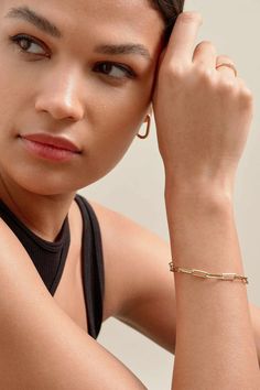 We heard you were looking for the perfect everyday bracelet. So we thought we'd make you one. Add modern elegance to your look with this chunky Paperclip Chain. Crafted with 18k gold plated recycled sterling silver. The perfect partner for your next formal look - and a white t-shirt's best friend. Classic Everyday Chain Bracelets, Classic Chain Bracelets For Everyday, Gold-tone Oval Link Bracelet For Everyday, Classic Bracelet With Adjustable Chain For Everyday, Classic Bracelets With Adjustable Chain For Everyday, Modern Gold-tone Bracelet For Everyday Wear, Modern Gold-plated Jewelry With Paperclip Chain, Timeless Bangle Jewelry With Box Chain, Timeless Bangle With Box Chain