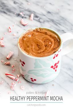 healthy peppermin mocha in a mug with candy canes around it and text overlay that reads, pale & vegan healthy peppermint mocha