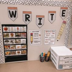 the writing station is decorated with black and white polka dots