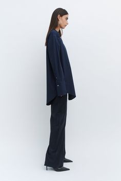 Our Navy grandad oversized tailored shirt is made of 100% organic cotton poplin. The shirt features a traditional collar, button stand with mother of pearl buttons and oversized cuffs with our signature button detail. French Seam, Mother Of Pearl Buttons, Poplin Shirt, Pearl Buttons, Navy Stripes, Button Detail, Cotton Poplin, Oversized Fits, Fabric Care