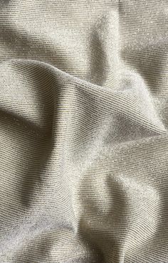 an up close shot of a white fabric