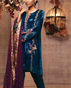 Winter wedding velvet Pakistani dress,blue embellished short kurta with velvet straight pant,designer formal pant suit with dupatta 🌸KURTA This beautiful velvet kurti has embroidery over the neck, sleeves and hem line BOTTOM Straight embellished velvet pant 🌸DUPATTA Net embellished duppata has lace border on all four sides ✨This outfit is perfect for festive occasion,girls party, wedding function. ✨We do not deal with replica. These are all designer inspired custom made dress as per our custom Velvet Pakistani Dress, Emerald Velvet, Velvet Dress Designs, Velvet Suit, Velvet Collection, Pakistani Dress Design, Pakistani Designers, Embroidery Suits, Suit Designs