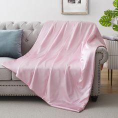 PRICES MAY VARY. Soft & Cozy - This silky throw blanket is super soft, lightweight, warm and cozy enough for all year use, sure to become your new favorite blanket! It's also durable, breathable and so comfortable with our 600 thread count premium satin fabric. Versatile & Decorative - Cuddling up while you're napping in the bed, couch or sofa, tucking in by the fire enjoying your time at home with your lived ones, making this satin blanket a perfect companion and elegant decoration both indoor Satin Blanket, Silk Blanket, White Throw Blanket, Travel Car, Blanket For Couch, Cooling Blanket, White Blanket, By Plane, Elegant Decor