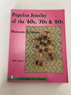 Hi Everyone, Thank you for viewing all of our over 1600 items here and Lover Antiques and Vintage. Please FOLLOW US as we add "new" items nearly everyday. We are so happy to be featuring this Vintage Book, Popular Jewelry of the 60's, 70's & 80's. It was written by Roseann Ettinger. Copyright 1997. It is a large, softcover edition, in Very Good Condition. We are listing lots more so please FOLLOW us. Ask us any questions. Thank you! Please Note- All items are shipped with insurance and tracking to ensure your complete happiness. Please do not hesitate to ask us any questions 518-944-0256. Thank You Ask Us - We love to combine shipping on two or more items.**Thank You For Supporting My Mom-Powered Small Business Jewelry Book, Popular Jewelry, Pricing Jewelry, Guide Book, Book Lover, Vintage Book, Costume Jewelry, Etsy Vintage, Book Worms