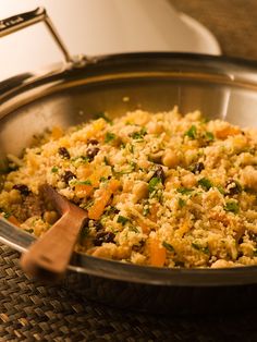 a pan filled with food sitting on top of a table