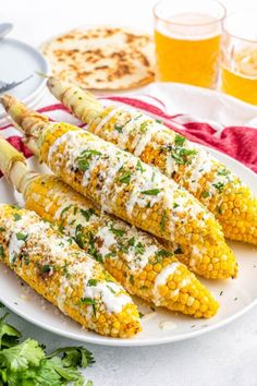 grilled corn on the cob with cheese and herbs