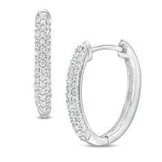 You don't need a special occasion to treat her to a gorgeous pair of diamond hoop earrings. Fashioned in cool 10K white gold, these classic hoops glisten with shimmering diamonds that encompass all sides of the front outside edge. A smart and stylish look anytime, these hoops captivate with 1/4 ct. t.w. of diamonds and a polished shine. The hoops secure comfortably with hinged backs. White Diamond Sparkling Hoop Earrings, Sparkling White Diamond Hoop Earrings, Classic Sparkling Hoop Diamond Earrings, Classic Sparkling White Gold Hoop Earrings, Zales Zales, Diamond Hoop Earrings, Accessories Jewelry Earrings, Diamond Stone, Diamond Clarity