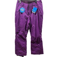 a purple snowboard pants with tags on it