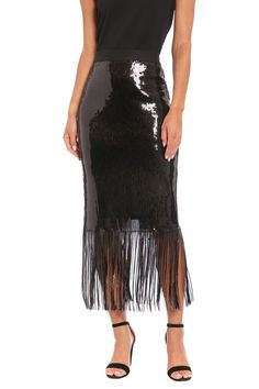 Make a dazzling statement in our Chelsea sequin fringe midi skirt. This show-stopping piece features an alluring sequin-covered body that catches the light with every move, culminating in a playful fringe hem that swings as you walk. Perfect for New Year's Eve parties, cocktail soirées, or any event where you want to shine. For a more subdued look, team it with a simple silk camisole. The Chelsea skirt effortlessly transitions from dinner to the dance floor, ensuring you're the muse of every occ Fitted Party Bottoms With Beaded Fringe, Fitted Party Skirt With Tassels, Fitted Tassel Skirt For Party, Sequin Fringe Dress For Night Out Party Season, Sequin Fringe Dress For Party Season, Summer Party Skirt With Beaded Fringe, Party Fitted Fringe Skirt, Fitted Fringe Skirt For Party, Party Season Fringe Skirt For Night Out