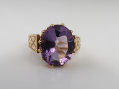 Estate 14k rose gold amethyst ring size 5. a 10mm amethyst stone. great shape. no chips or damage. 2.8 grams. Gold Amethyst Ring With Diamond Cut, Oval Shape, Gold Oval Amethyst Ring With Diamond Cut, Oval Diamond Cut Yellow Gold Amethyst Ring, Oval Amethyst Ring In Yellow Gold With Diamond Cut, Yellow Gold Amethyst Ring, Gold Amethyst Ring, Baby Rings, Amethyst Gem, Purple Band