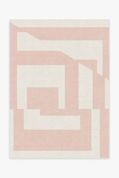 a pink and white rug with an abstract design on the bottom corner, in shades of beige