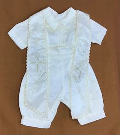 Baby Boy Baptism outfit in color  ivory  Sash is attached and removable  Embroidered Measurements are in inches: Size 6-9 months, Jumper = Shoulder to shoulder 8.5"- waist 16"+ 3" ELASTIC , long 19", Size 9-12 months, Jumper = Shoulder to shoulder 9"- waist 17"+3" ELASTIC ,long 21"  Size 12-18 months, Jumper = Shoulder to shoulder 9" ,waist 19"+3" ELASTIC, long 23.5" Size 18-24 months, Jumper = Shirt -Shoulder to shoulder 10. ,waist 20"+ 3" ELASTIC, long 24" Size  2T, Jumper = Shirt ,Shoulder to shoulder 10.5" ,waist 21"+3" ELASTIC ,long 25" Sizs 3 Jumper  =Shirt Shoulder to shoulder 11" ,waist 22"+ 3" ELASTIC , long 26" Baby Boy Baptism Outfit, Boy Baptism Outfit, Baby Boy Baptism, Baptism Outfit, Baby Boy Clothing Sets, Christening Outfit, Boy Baptism, Jumper Shirt, Clothing Sets