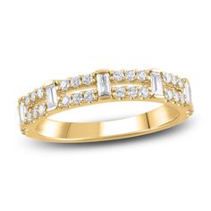 Chic and subtle, this two-row diamond band is a stylish addition to your ring stack. 10K yellow gold Vertical baguette-cut diamonds and round diamonds adorn the split shank Total diamond weight is 1/2 carat Anniversary Yellow Gold Stackable Rings With Baguette Diamonds, Dazzling Stackable Yellow Gold Diamond Ring, Elegant Yellow Gold Faceted Stackable Rings, 14k Yellow Gold Stackable Rings With Baguette Diamonds, Fine Jewelry Yellow Gold Stackable Rings With Baguette Diamonds, Jared The Galleria Of Jewelry, Split Shank Ring, Mom Ring, Gold Rings Fashion